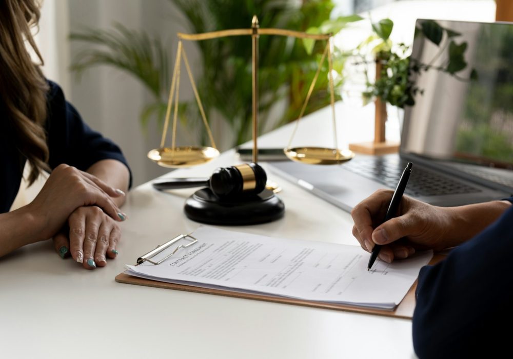 Hands are signing contract agreement. Contract agreement policy concept.