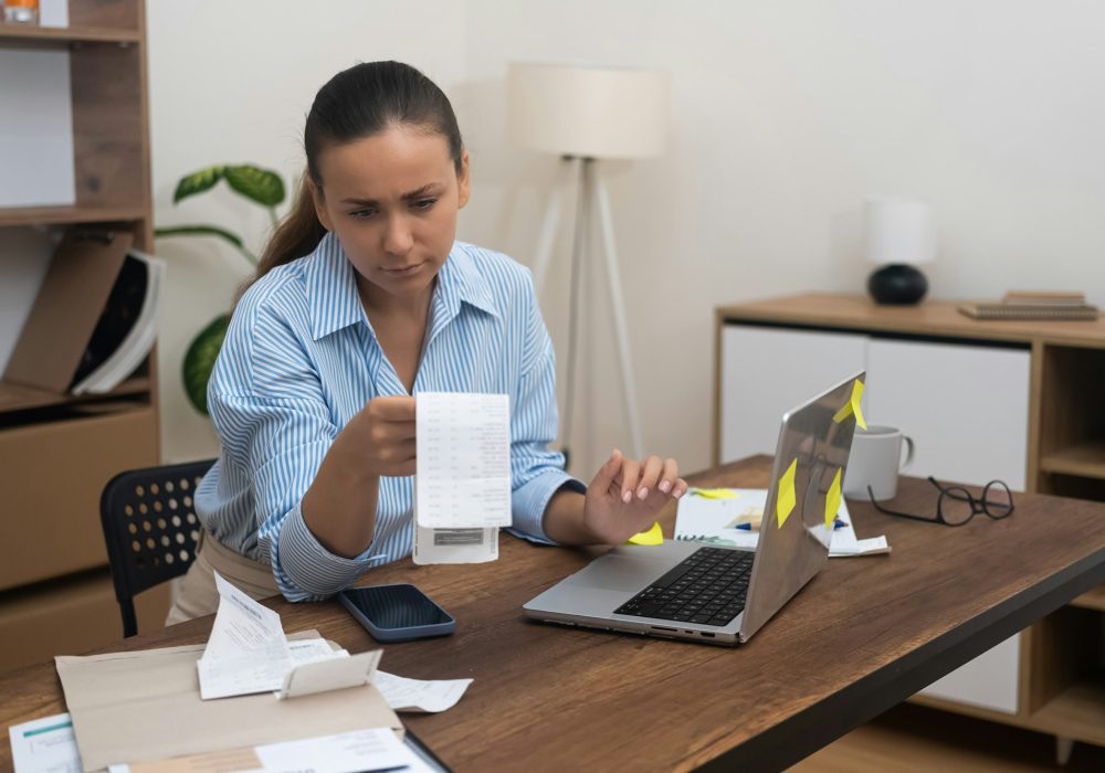 home accountant, bookkeeping, calculates annual finances on calculator, manages tax declarations.